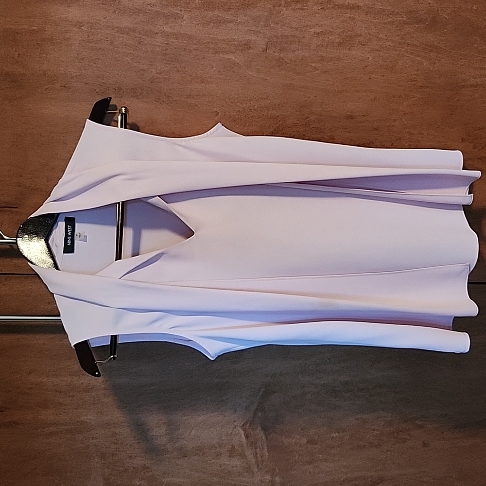 Nine West woman's blouse. Size M. Light pink.